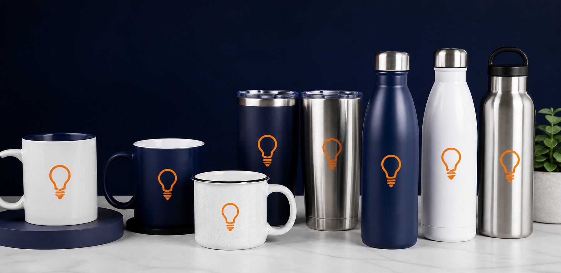 Sample custom drinkware lineup with mugs, tumblers, and bottles